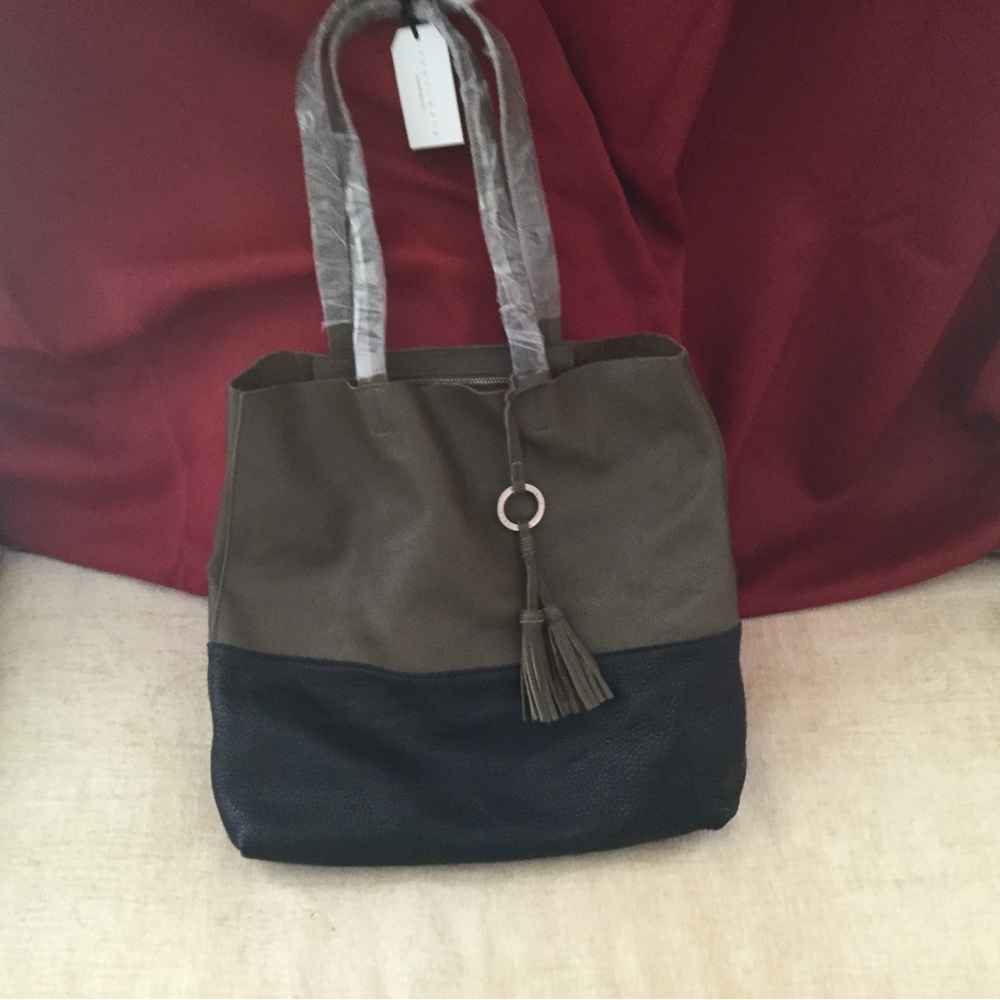 Sanctuary green and black color block leather tote.